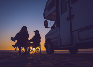 motorhome couple sunset beach